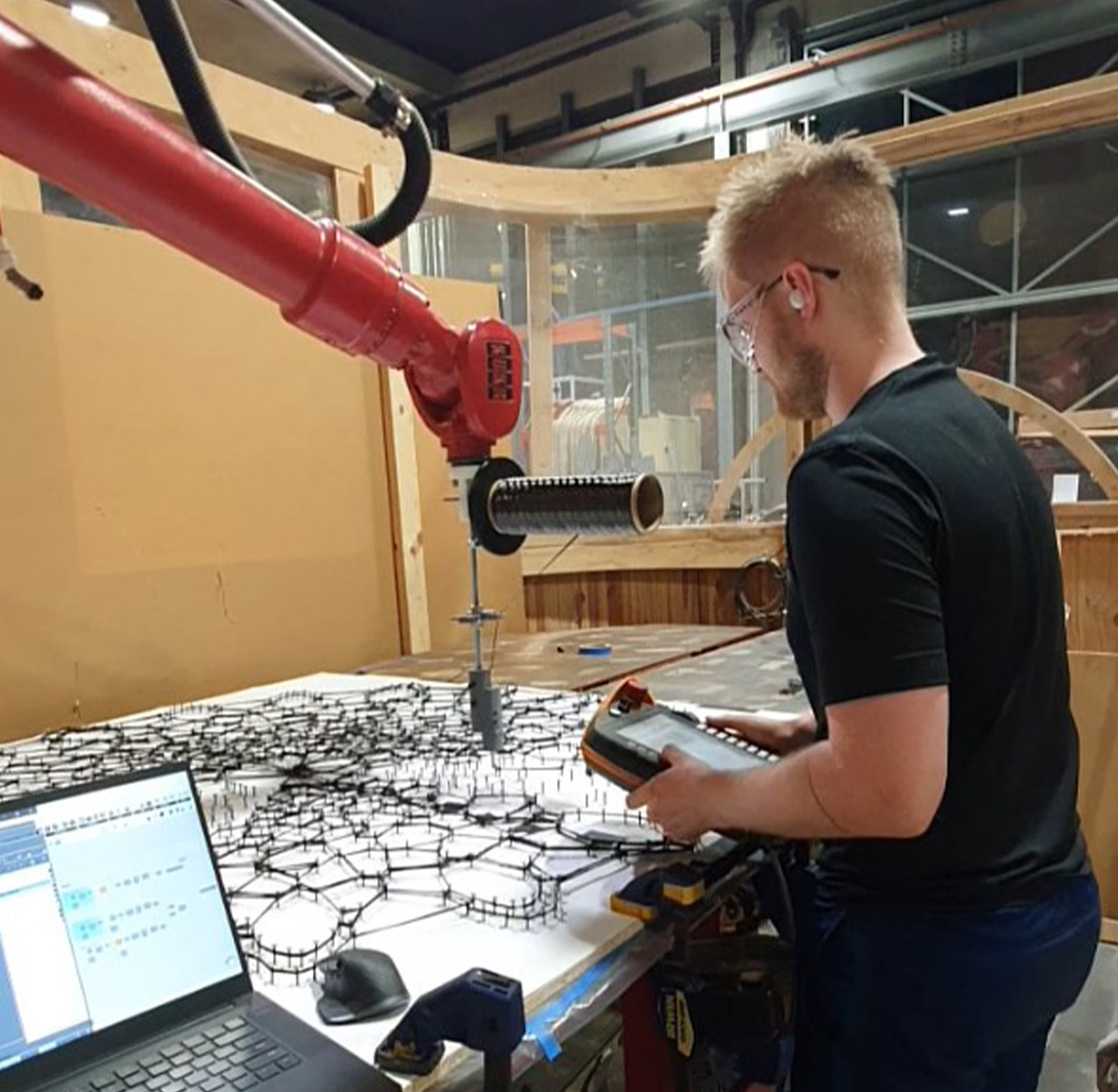 Robotic Tabletop Kelton operating the robot arm during fabrication